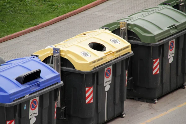 Different containers for recycling wastes