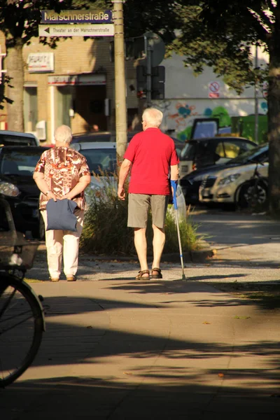 Ageing People Walking Park — Stock Photo, Image