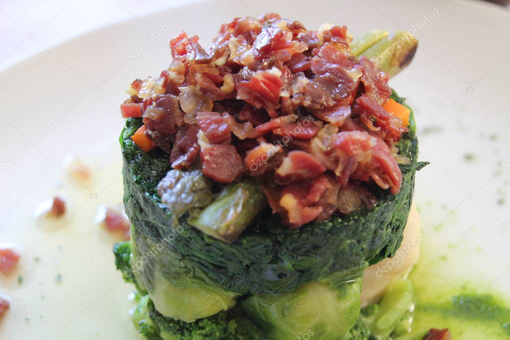 Spinach and bacon in a dish