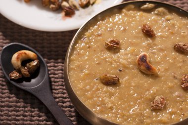 Tasty Thick and creamy Dal payasam from India clipart
