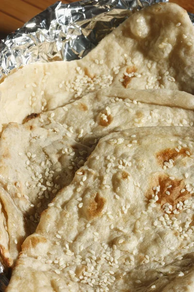 Naan is a round flatbread from India — Stock Photo, Image