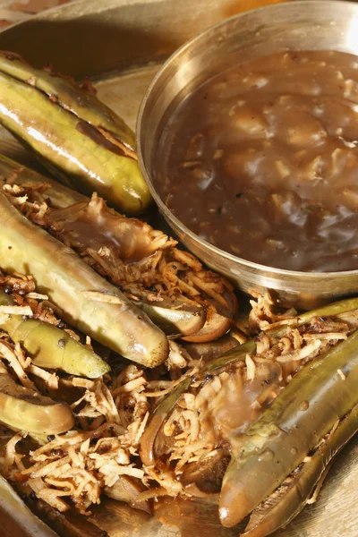 Ginger Tamarind Eggplant - A Eggplant (brinjal) in ginger tamarind sauce. — Stock Photo, Image