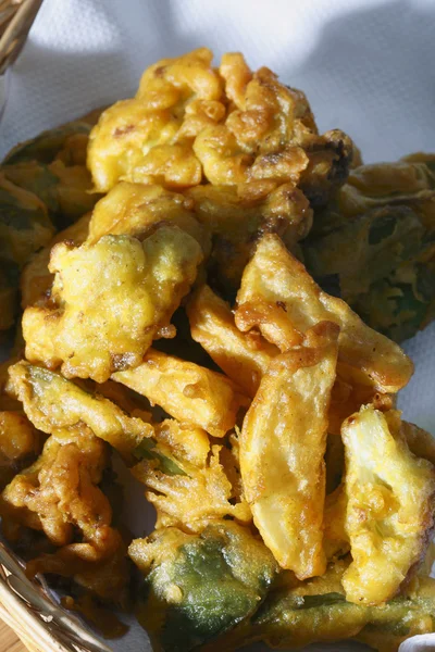 Vegetable Fritters - a snack made from cut vegetables and gram flour — Stock Photo, Image