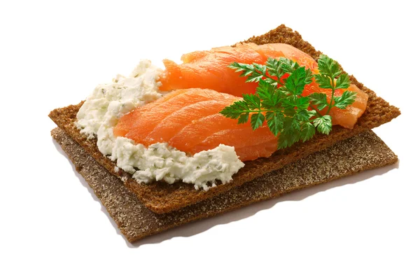 Bread crisp with salmon, soft cheese and chervil — Stock Photo, Image