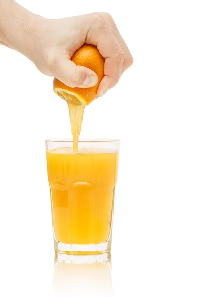 Hånd klemmer juice – stockfoto