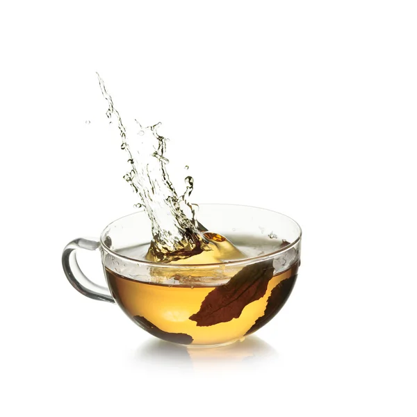 Cup of tea with splash — Stock Photo, Image