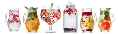 Collection of different drinks in batch glasses