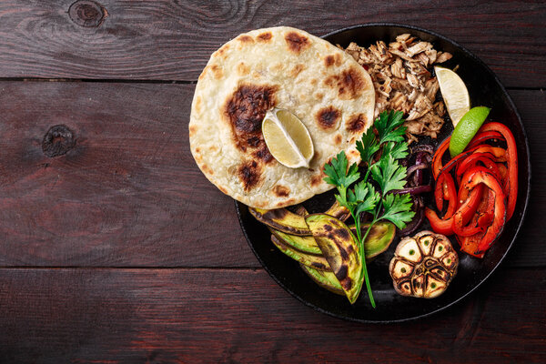 Pork fajitas on table