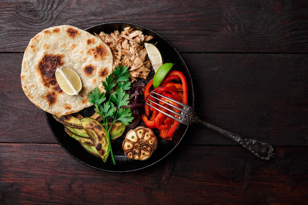 Pork fajitas on table