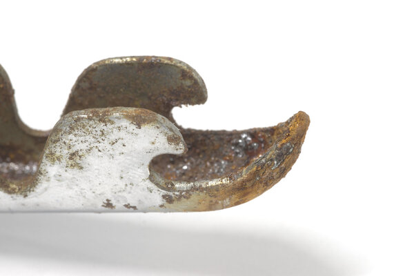 Closeup of rusty can opener