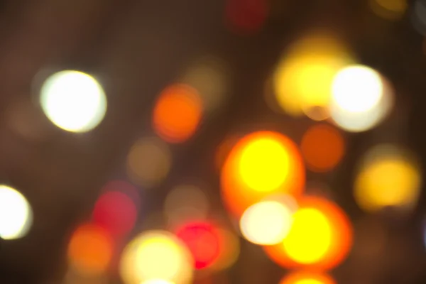 Abstracte wazig donkere achtergrond met een heleboel bokeh — Stockfoto