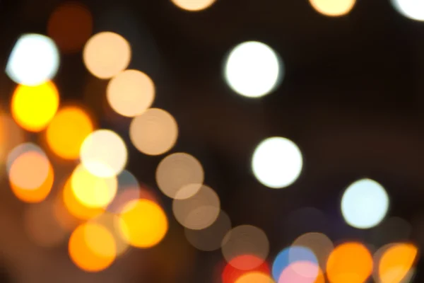 Abstracte wazig donkere achtergrond met een heleboel bokeh — Stockfoto