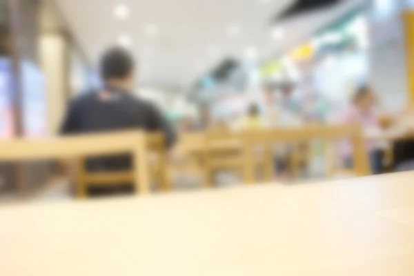 Abstract blurry bright restaurant inside shopping mall — Stock Photo, Image