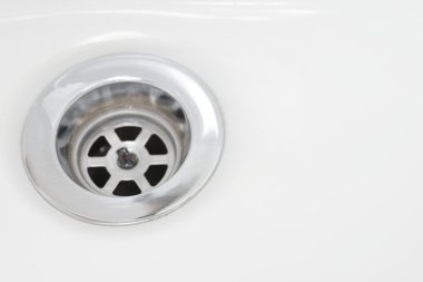 Paslanmaz çelik closeup arka plan beyaz lavabo drenaj