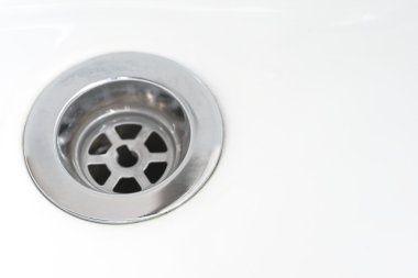 Paslanmaz çelik closeup arka plan beyaz lavabo drenaj