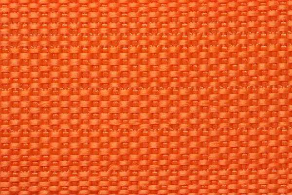 Closeup of orange color Polyester bag textile handler background — Stock Photo, Image
