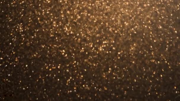 Efeito Bokeh, a textura de gelo na janela é uma tonalidade dourada — Vídeo de Stock