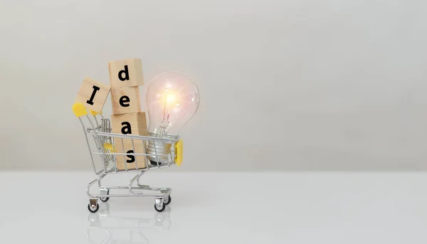 Alphabet Text Word Ideas Wooden Block Cube Light Bulb Shopping — Stock Photo, Image