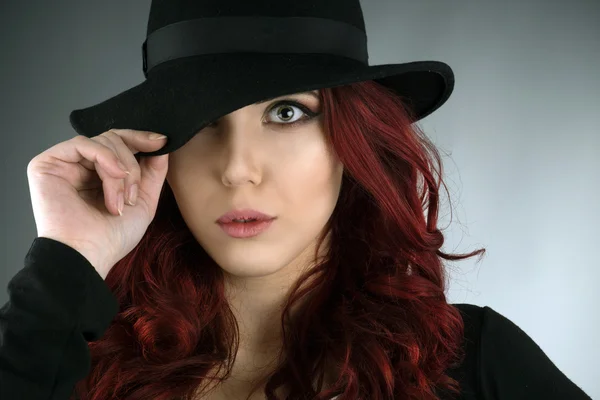 Close up portrait of a beautiful young redhead woman — Stock Photo, Image