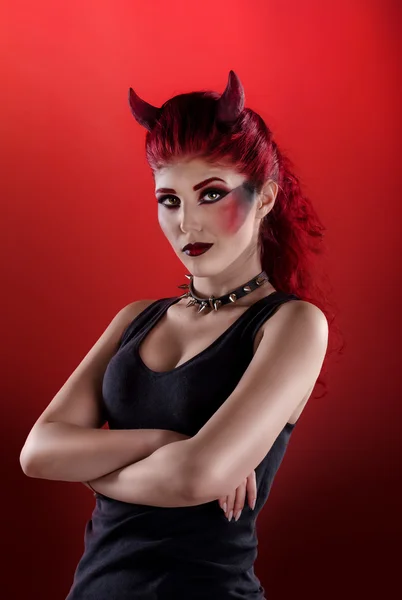 Woman with professional make up dressed as the devil — Stock Photo, Image