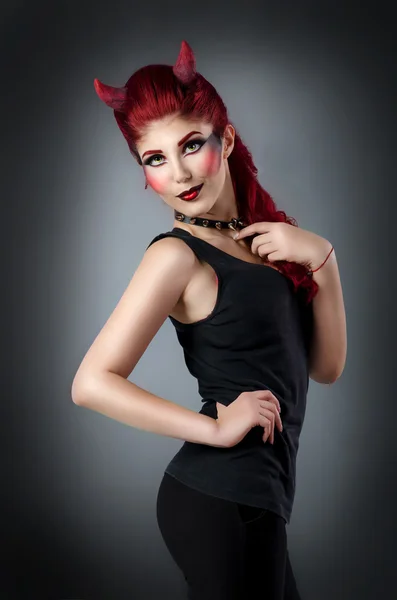 Woman with professional make up dressed as the devil — Stock Photo, Image