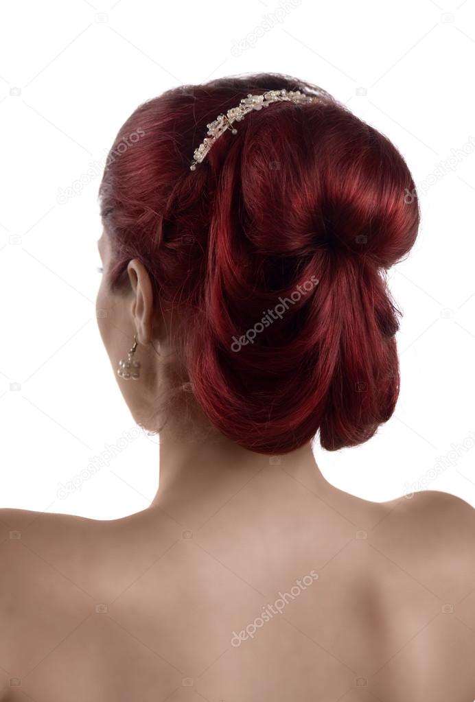 Back view of a young woman with bridal hairstyle