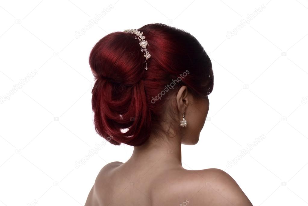 Back view of a young woman with bridal hairstyle
