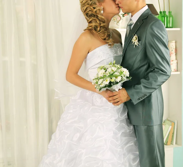 Wedding kiss just married couple