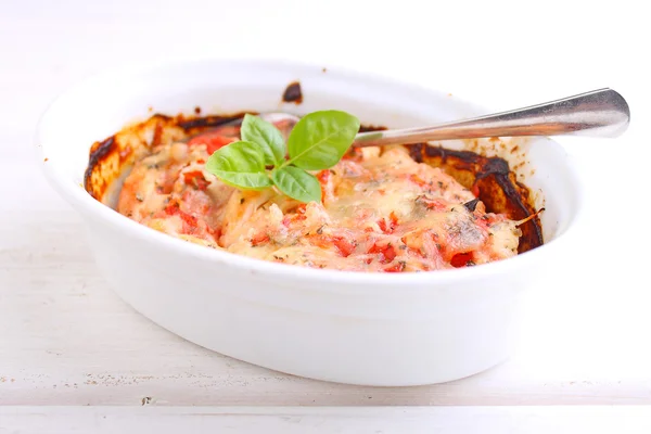 Chicken baked with tomatoes and cheese — Stock Photo, Image