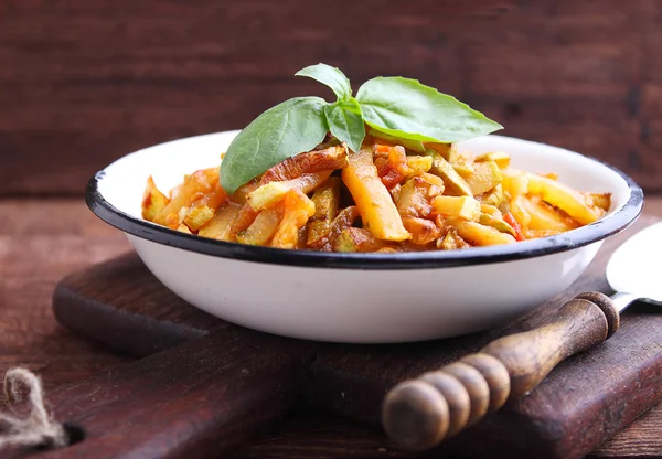 Ragout of zucchini and tomatoes in plate — Stock Photo, Image