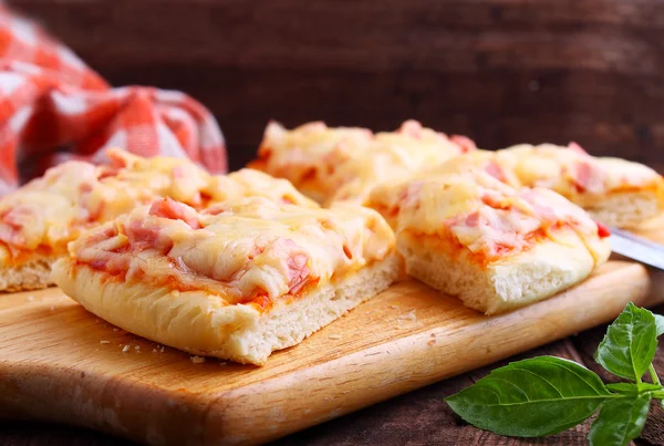 Pizza with tomato sauce and cheese Stock Photo