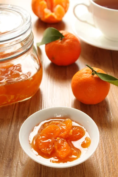 Tangerines jam in a glass jar — Stock Photo, Image