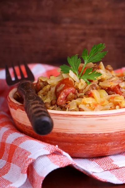 Sausages with stewed cabbage — Stock Photo, Image