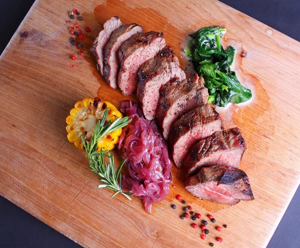 Beef steak with corn — Stock Photo, Image