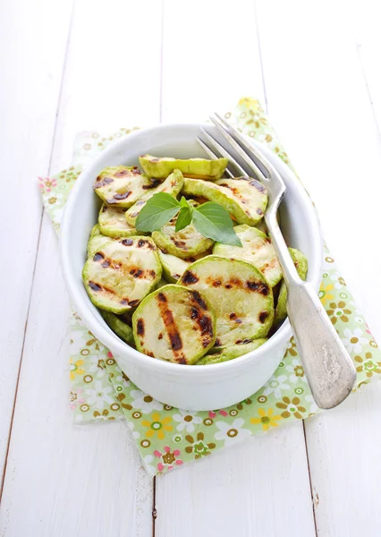 Grilled zucchini in a white plate — Stock Photo, Image