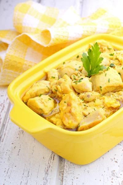 Chicken curry in a yellow bowl — Stock Photo, Image