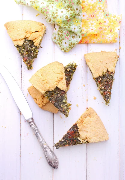 Tasty pie with herbs and greens — Stock Photo, Image