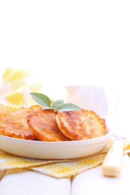 Tasty fritters on plate