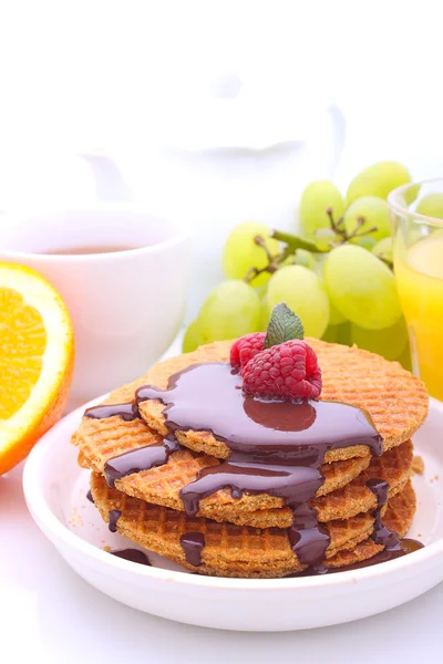 Waffles with chocolate and raspberries — Stock Photo, Image