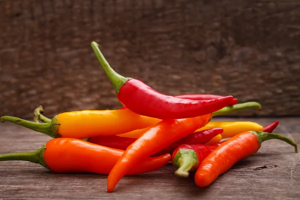 Hot red, yellow, orange peppers — Stock Photo, Image