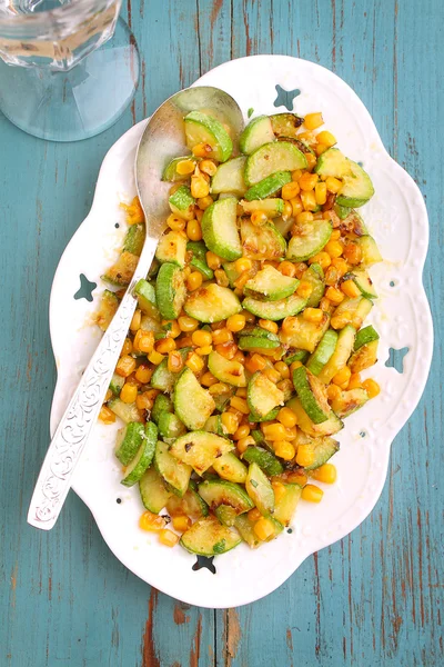 Side dish of zucchini with corn and cheese — Stock Photo, Image