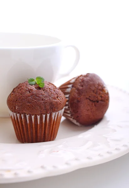 Chocolade cupcakes met een kopje thee — Stockfoto