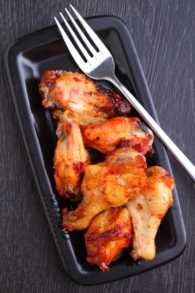 Hühnerflügel in Tomatensauce gebacken — Stockfoto