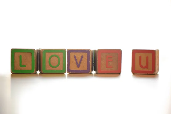 Liefde alfabet in houten blokken — Stockfoto
