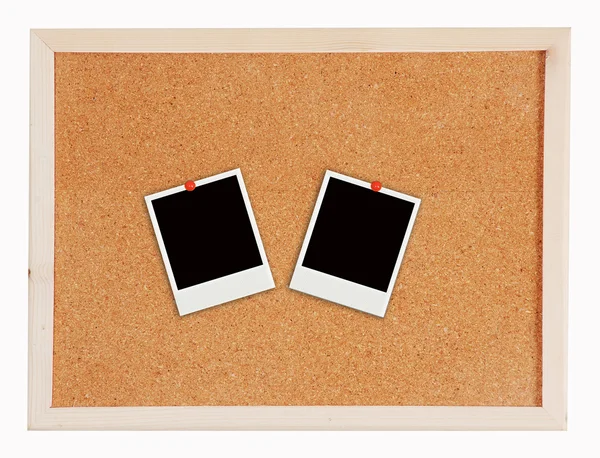 软木板上的两个相框 — 图库照片