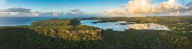 Aerial view above scenery of Curacao, Caribbean with ocean, coast, hills  clipart