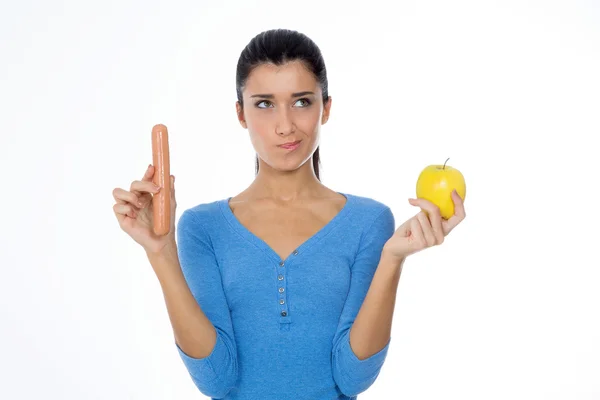 Mujer Sosteniendo Una Manzana Una Salchicha Imagen De Stock