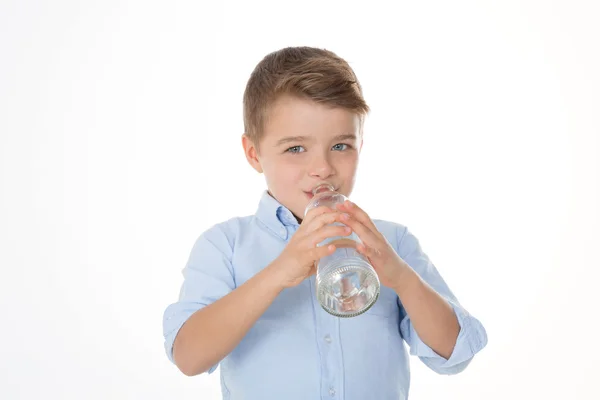 Menino com garrafa de vidro — Fotografia de Stock