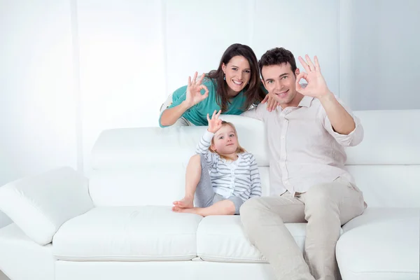 Mom dad and daughter make ok with the hand — Stock Photo, Image