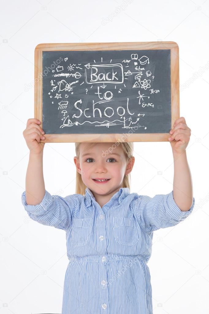 happy child with smock and blackboard